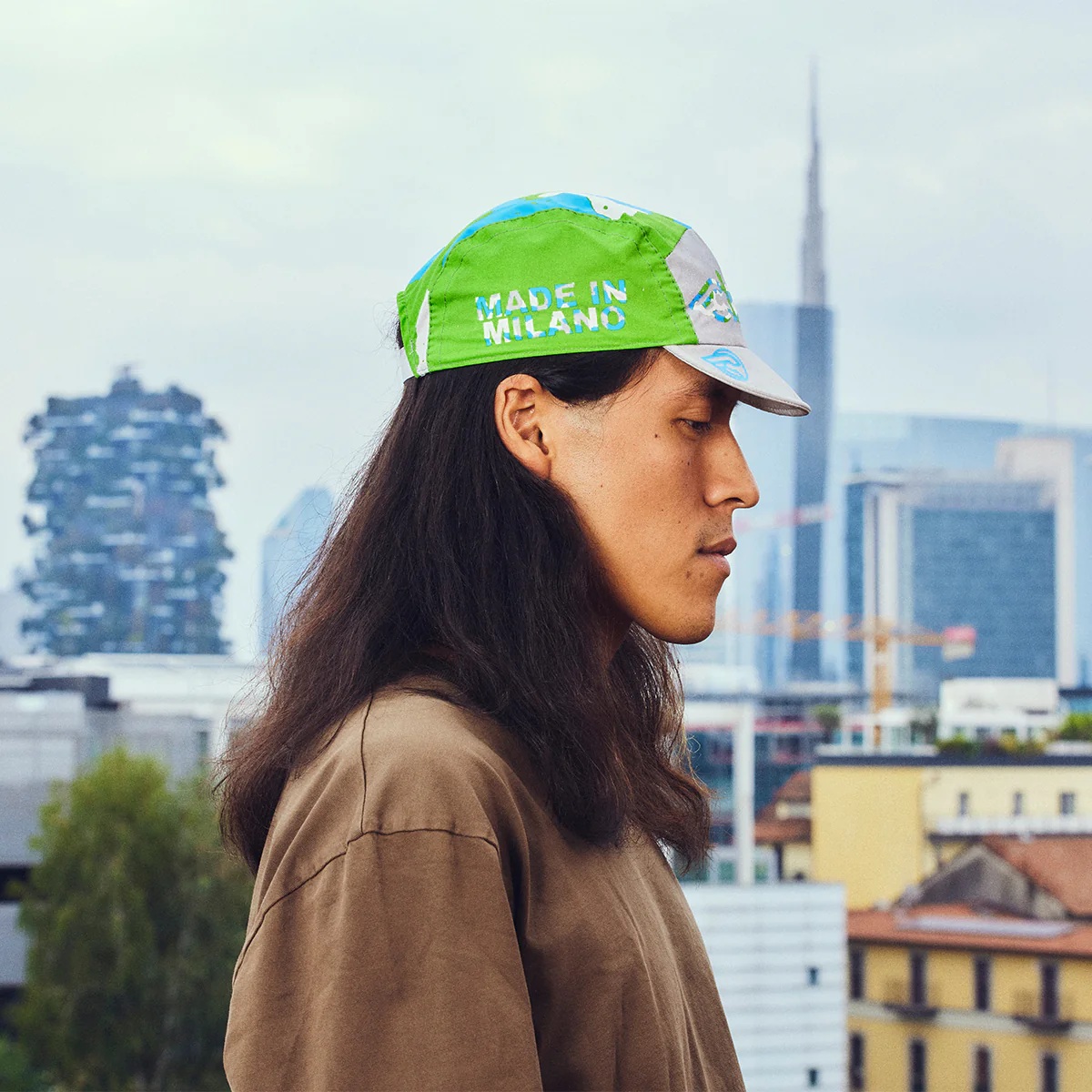 CAP GLOBAL CYCLING GREEN AND BLUE
